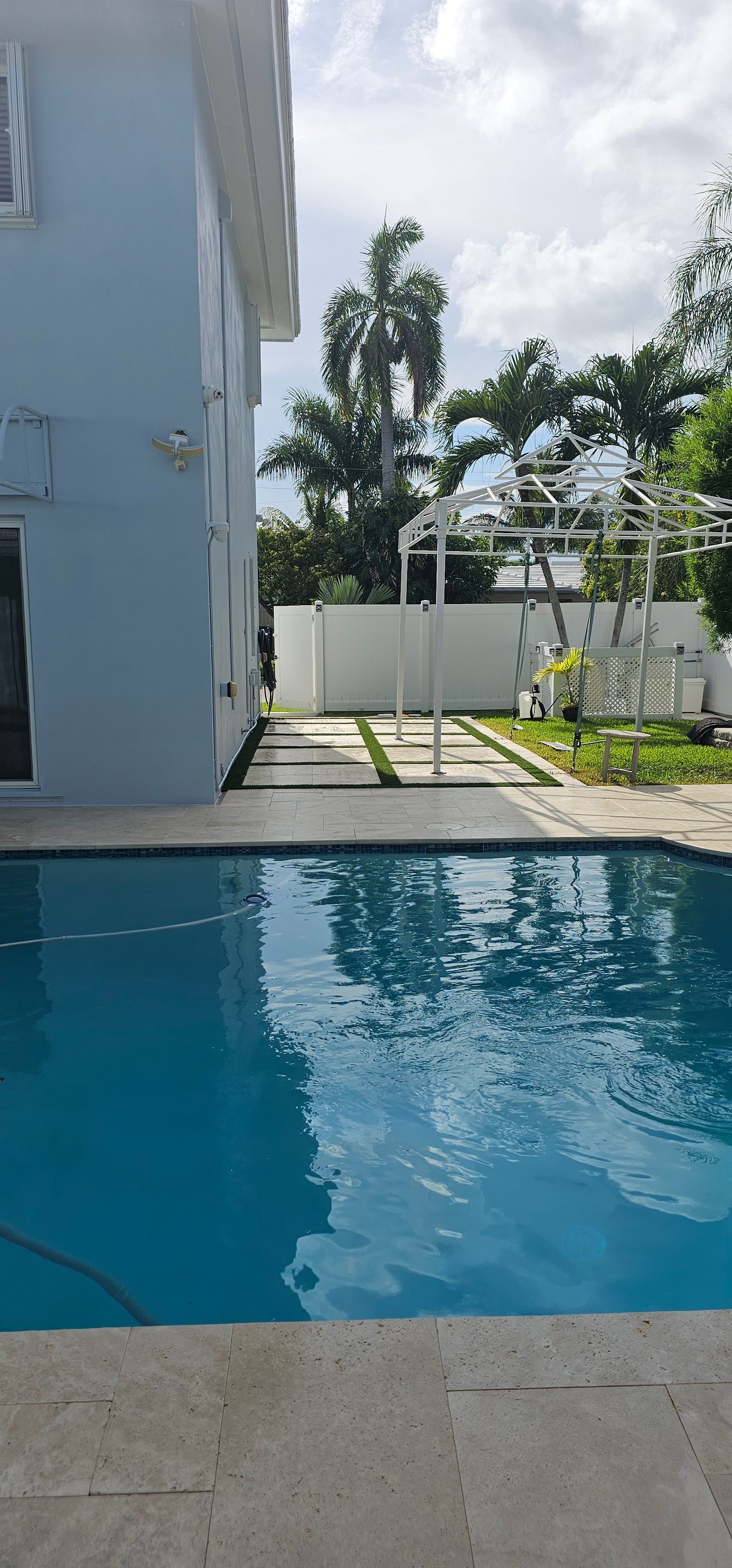 Travertine bullnose pool coping installation in South Florida by Craft Pavers